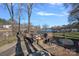 Cozy fire pit area overlooking the lake, perfect for outdoor gatherings at 15015 Nc Hwy 73 Hwy, Huntersville, NC 28078