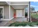 Charming front entrance with double doors and stone-lined landscaping at 15015 Nc Hwy 73 Hwy, Huntersville, NC 28078