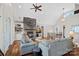 Cozy living room with stone fireplace, built-in bookshelves, and comfortable seating at 15015 Nc Hwy 73 Hwy, Huntersville, NC 28078