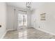 Bright, airy room with tiled floors, natural light from window, and white door at 153 Byers Rd, Troutman, NC 28166