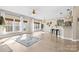 Bright and spacious living room with lots of windows and a view of a breakfast bar area at 153 Byers Rd, Troutman, NC 28166