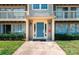 Inviting condo front door with well-maintained landscaping and secure mail delivery at 1614 Arlyn Cir, Charlotte, NC 28213