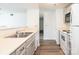 Efficient kitchen with white appliances, ample cabinetry, and convenient layout at 1614 Arlyn Cir, Charlotte, NC 28213