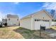 Exterior view of a house with siding, a detached garage, and a mailbox at 19531 Deer Valley Dr, Cornelius, NC 28031