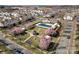 Aerial view of community with pool, clubhouse, gazebo and blooming cherry trees at 19531 Deer Valley Dr, Cornelius, NC 28031