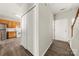 Bright entryway with hardwood floors, closet, and a view into the kitchen at 19531 Deer Valley Dr, Cornelius, NC 28031