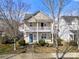 Charming two-story home with a welcoming front porch and neat landscaping at 19531 Deer Valley Dr, Cornelius, NC 28031
