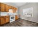 Kitchen features ample cabinet space, white appliances, and natural light at 19531 Deer Valley Dr, Cornelius, NC 28031