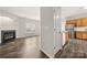 Bright living room featuring hardwood floors, fireplace and kitchen at 19531 Deer Valley Dr, Cornelius, NC 28031