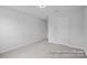 Neutral walls, carpeted floor, and white doors offer a blank canvas for customization at 2302 E Main St # 1P, Albemarle, NC 28001