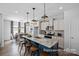 Modern kitchen features a large center island with a granite countertop and stainless steel appliances at 2302 E Main St # 1P, Albemarle, NC 28001