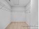 Walk-in closet with ample shelving and storage space at 2302 E Main St # 1P, Albemarle, NC 28001