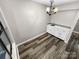 View of dining area with laminated flooring and a countertop with bar seating at 2507 Kilborne Dr # H, Charlotte, NC 28205