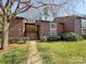 Inviting two-story condo with charming exterior details and lush landscaping, offering a warm and welcoming appeal at 2507 Kilborne Dr # H, Charlotte, NC 28205
