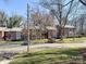View of a residential complex, showcasing the building's architecture and well-kept surroundings at 2507 Kilborne Dr # H, Charlotte, NC 28205