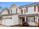 Charming townhome with a well-maintained front yard and a one-car garage at 307 Rose Garden Ct, Rock Hill, SC 29732