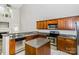 Bright kitchen with an island, stainless steel appliances, and ample counter space at 307 Rose Garden Ct, Rock Hill, SC 29732