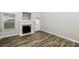 Cozy living room with modern flooring, a fireplace, and access to the outdoors at 307 Rose Garden Ct, Rock Hill, SC 29732