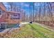 Beautiful backyard with a screened in porch and patio area at 320 Heritage Pl, Mooresville, NC 28115