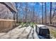 This backyard has a lovely fire pit area with chairs at 320 Heritage Pl, Mooresville, NC 28115