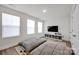 Bright bonus room with two oversized pillows, three windows with blinds, and a storage bench at 320 Heritage Pl, Mooresville, NC 28115