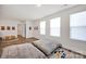 Bright bonus room with two oversized pillows, three windows with blinds, and a separate playroom at 320 Heritage Pl, Mooresville, NC 28115