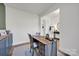 Bright home office with custom built-in desk and ample natural light at 320 Heritage Pl, Mooresville, NC 28115