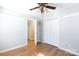 Bedroom with wood flooring, crown molding, closet, and access to ensuite bathroom at 3507 Sassafras Trl, Waxhaw, NC 28173