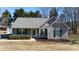 Charming single-story home with a welcoming front porch and well-maintained landscaping, situated in a serene neighborhood at 3507 Sassafras Trl, Waxhaw, NC 28173