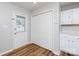 Hallway with a door to the outside and a closet, near the kitchen at 3507 Sassafras Trl, Waxhaw, NC 28173