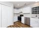 Functional kitchen with stainless steel appliances and ample white cabinets at 3507 Sassafras Trl, Waxhaw, NC 28173