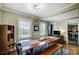 Bright dining room with hardwood floors and lots of natural light, adjacent to the dining room at 3800 Craig Ave, Charlotte, NC 28211