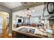 Open kitchen with appliances and stone countertops, perfect for entertaining while looking into the living room at 3800 Craig Ave, Charlotte, NC 28211