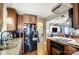 Well-equipped kitchen with stainless steel appliances and lots of cabinet space, leading to the living room at 3800 Craig Ave, Charlotte, NC 28211