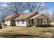 Spacious home with a covered front porch and a well-manicured front yard at 400 37Th Sw St, Hickory, NC 28602
