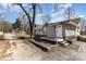 Charming single story home with gravel driveway and inviting front steps at 400 37Th Sw St, Hickory, NC 28602