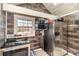 Compact kitchen featuring stainless steel appliances and wood-look walls at 400 37Th Sw St, Hickory, NC 28602