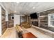 Cozy living room with a modern fireplace, mounted TV, and comfortable seating at 400 37Th Sw St, Hickory, NC 28602