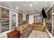 Inviting living room featuring modern wood-look walls, fireplace, recessed lighting, and comfortable seating at 400 37Th Sw St, Hickory, NC 28602