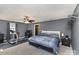 Primary bedroom featuring carpeted floor, neutral paint, ceiling fan, and a closet at 400 37Th Sw St, Hickory, NC 28602