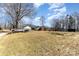 Large lot showcasing the expansive yard and home at 400 37Th Sw St, Hickory, NC 28602