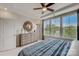 Inviting main bedroom with large windows, stylish dresser, and contemporary decor at 521 Annie Lowery Way, Davidson, NC 28036