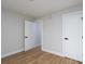 Bright bedroom with wood floors and white trim provides a modern and inviting space at 527 Crowell Ave, Statesville, NC 28677