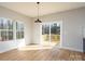 Bright dining area features a sliding glass door to the deck, and sunny windows at 527 Crowell Ave, Statesville, NC 28677