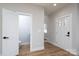 Bright entryway features wood floors, white trim, and a convenient half bath at 527 Crowell Ave, Statesville, NC 28677