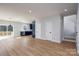 Open living space with modern kitchen, sliding doors to deck, and abundant natural light at 527 Crowell Ave, Statesville, NC 28677