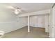 Spacious basement with painted floors and walls, providing a versatile living or storage area at 5304 Split Oak Dr, Charlotte, NC 28227