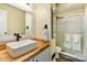 Modern bathroom with a sleek vanity, stylish fixtures, and a glass-enclosed shower at 5304 Split Oak Dr, Charlotte, NC 28227
