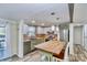 Bright kitchen features stainless steel appliances, updated cabinetry, butcher block countertops, and barstool seating at 5304 Split Oak Dr, Charlotte, NC 28227