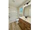 Bathroom featuring tub/shower and wood grain vanity at 613 Granite Ave, Gastonia, NC 28052